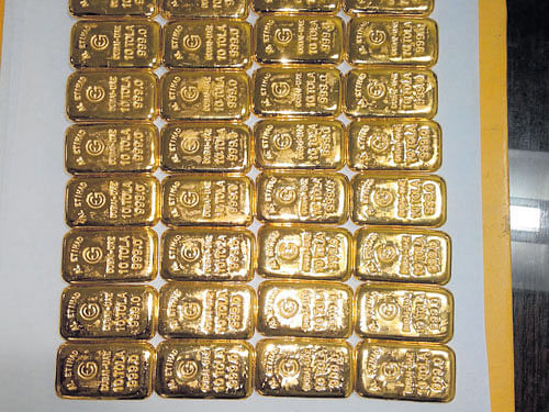 The gold biscuits seized from a woman at the Kempegowda International Airport in the City on Sunday. DH&#8200;photo