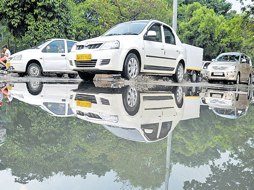 Welcome showers: Bengalureans heaved a sigh of relief when it rained on Thursday afternoon. DH photo