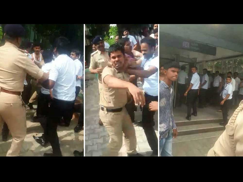 These pictures - culled from a video shot by a bystander on mobile phone - show BMRCL employees beating up KSISF constables at the Central College Metro station in Bengaluru on Thursday.