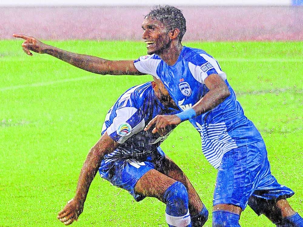 On target: Lenny Rodrigues celebrates after scoring Bengaluru FC's third goal against 4.25 SC at the Sree Kanteerava stadium on Wednesday. DH PHOTO/SRIKANTA SHARMA R