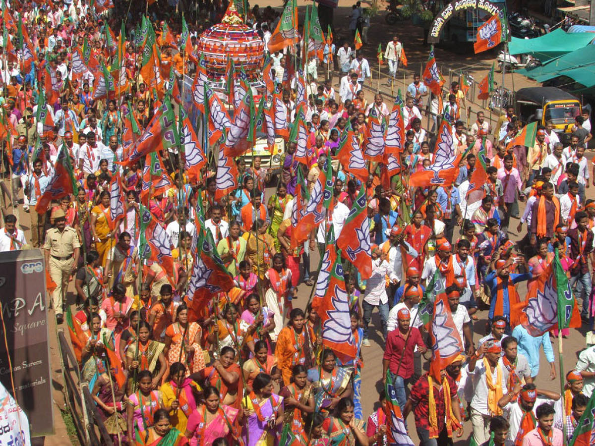 BJP workers take out Nava Karnataka Parivartana Yatra in Sullia on Friday.