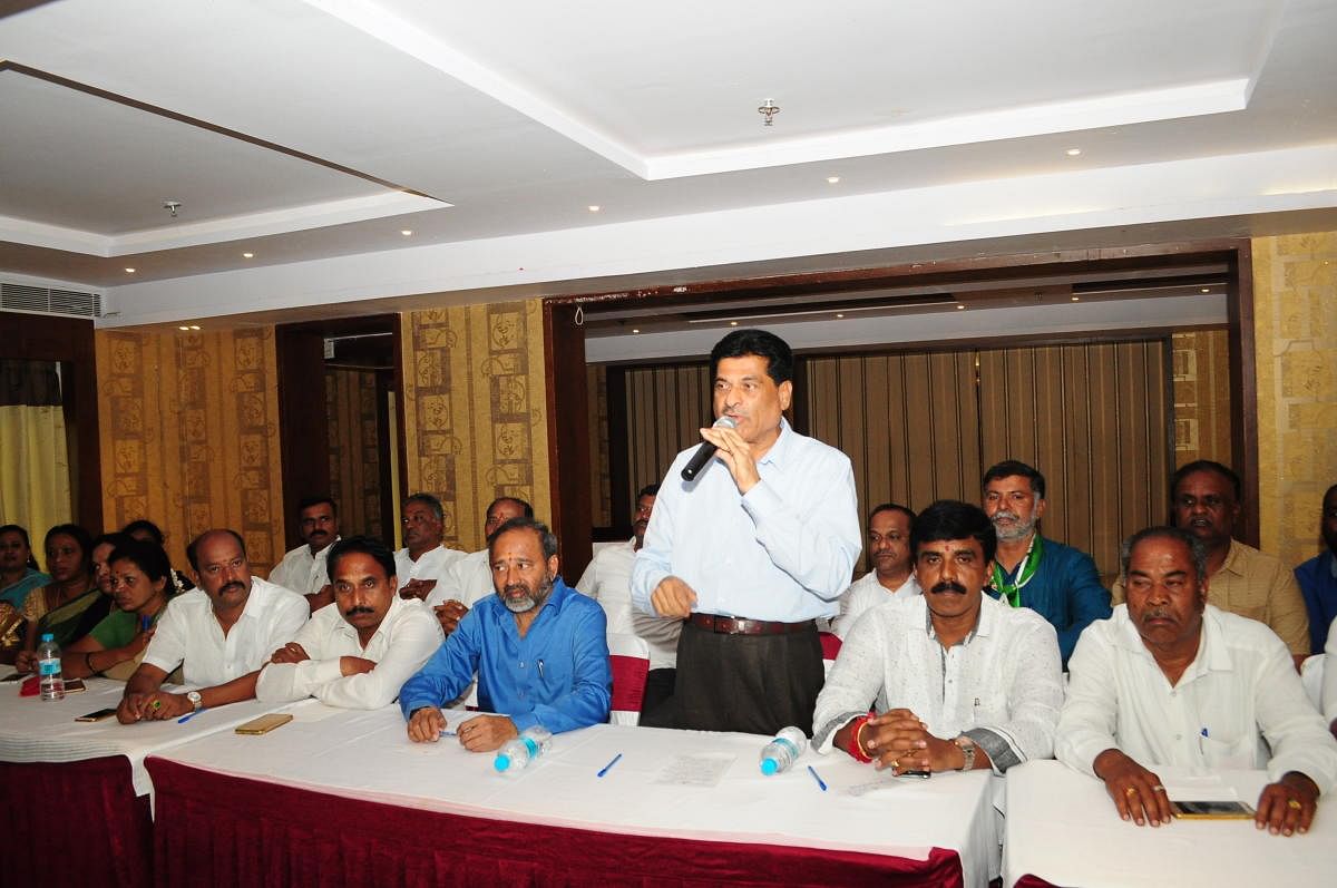 JD(S) leader K S Rangappa addresses the party workers at a meeting in a private hotel in Mysuru on Friday. Mayor M J Ravikumar, Corporator B L Bhyrappa, R Lingappa are seen.