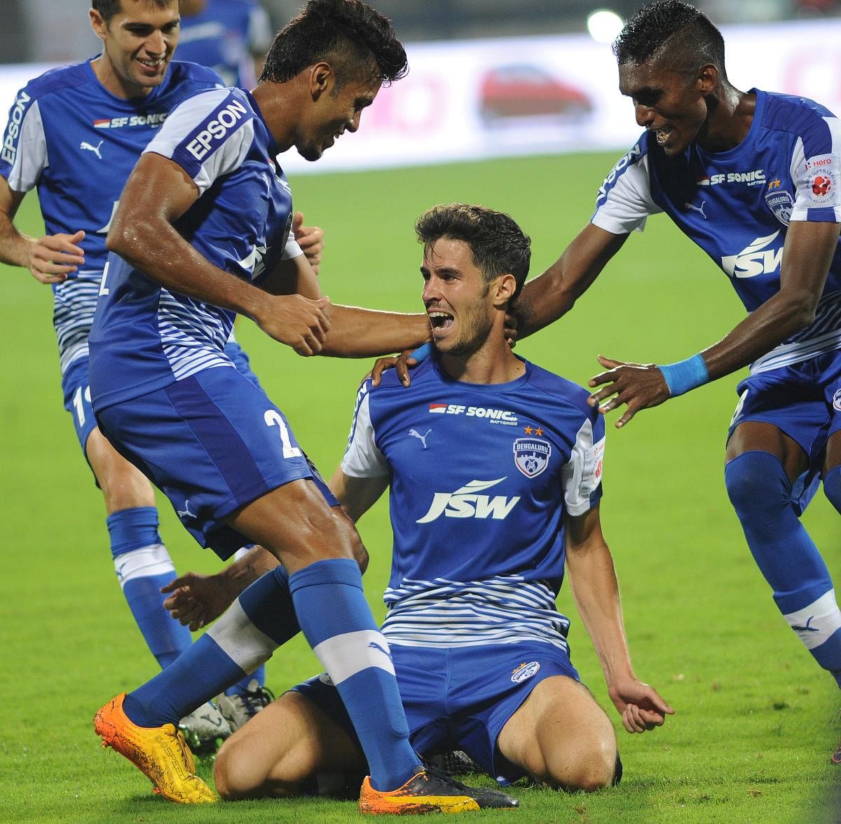 Bengaluru FC began their maiden Indian Super League campaign with a satisfying 2-0 win over Mumbai City FC at the Sree Kanteerava stadium on Sunday.