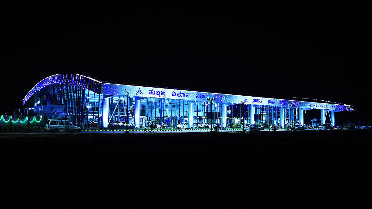 A view of the new terminal building of the upgraded airport in Hubballi illuminated on Monday evening, on the eve of its inauguration.