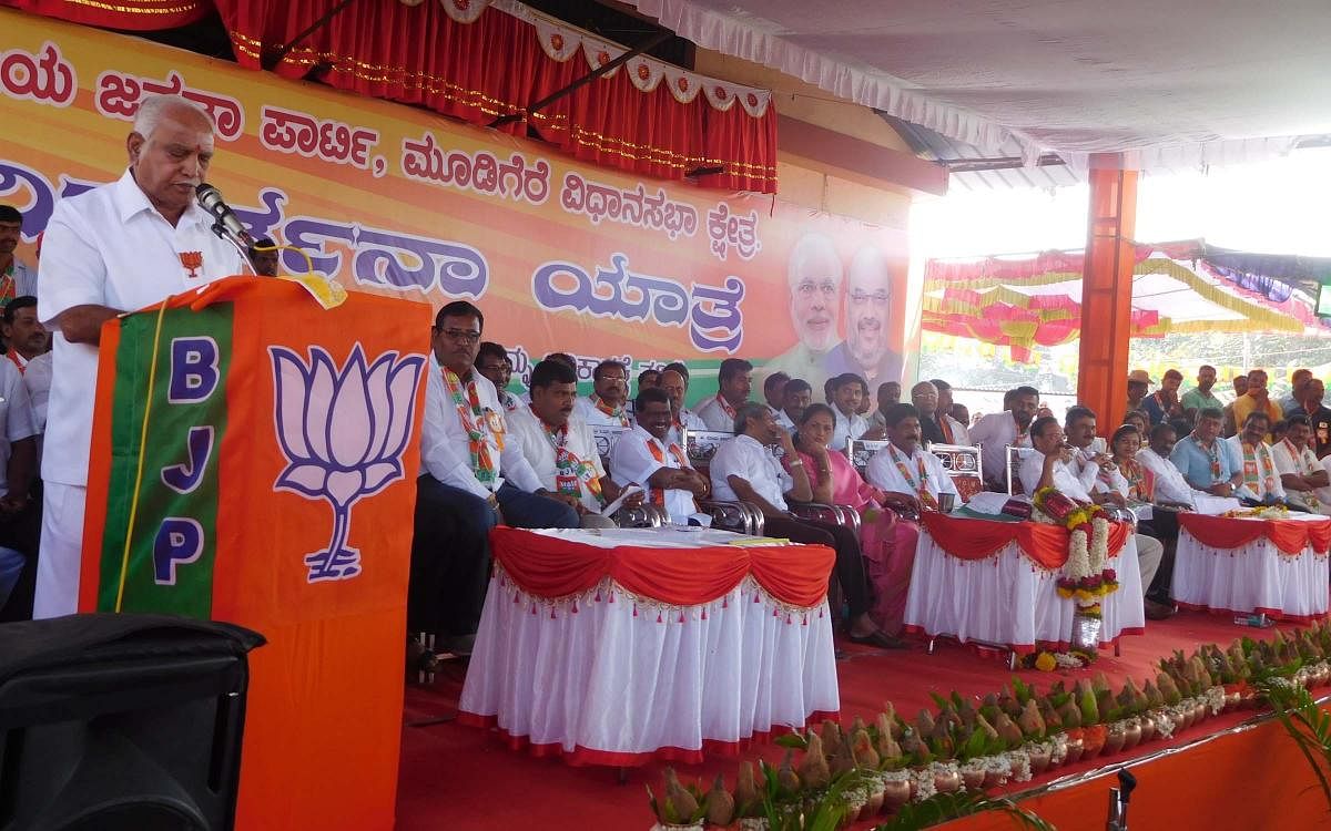 State BJP President B S Yeddyurappa speaks at BJP's parivarthana yathra in Mudigere on Saturday.