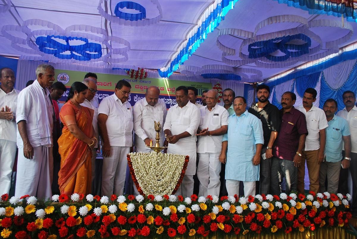 Transport Minister H M Revanna inaugurates a programme to mark laying foundation for heavy vehicle driving training institute at Kamblapadavu on Saturday.