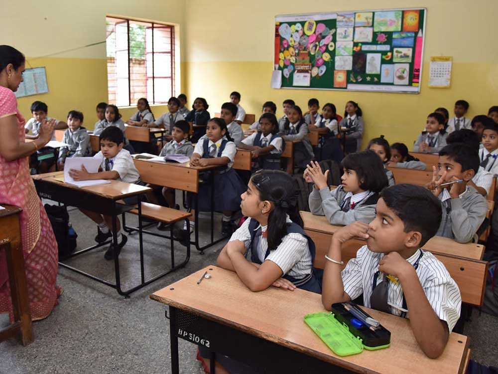 Andhra Pradesh, which is in the process of modernising and digitising teaching in all its government schools, is  considering  enacting a bill  which makes it compulsory for the children of elected representatives to study in government schools. File photo