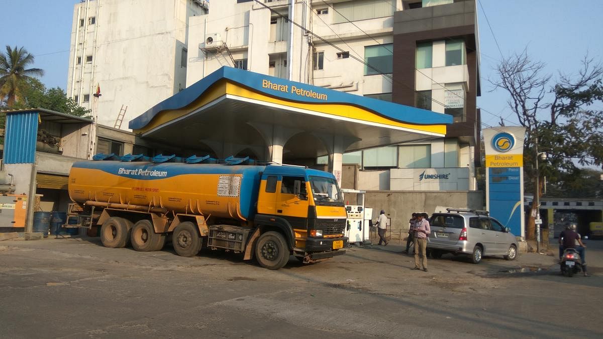 The fuel station near Shivananda Circle gets first of the three loads of the fuel supply scheduled on Sunday.