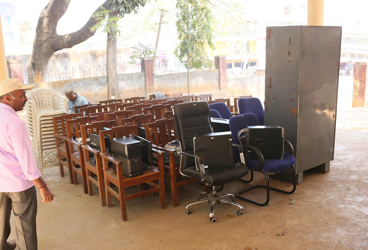 The furniture confiscated by the court staff from the Assistant Commissioner's office, at Sakleshpur, on Friday.