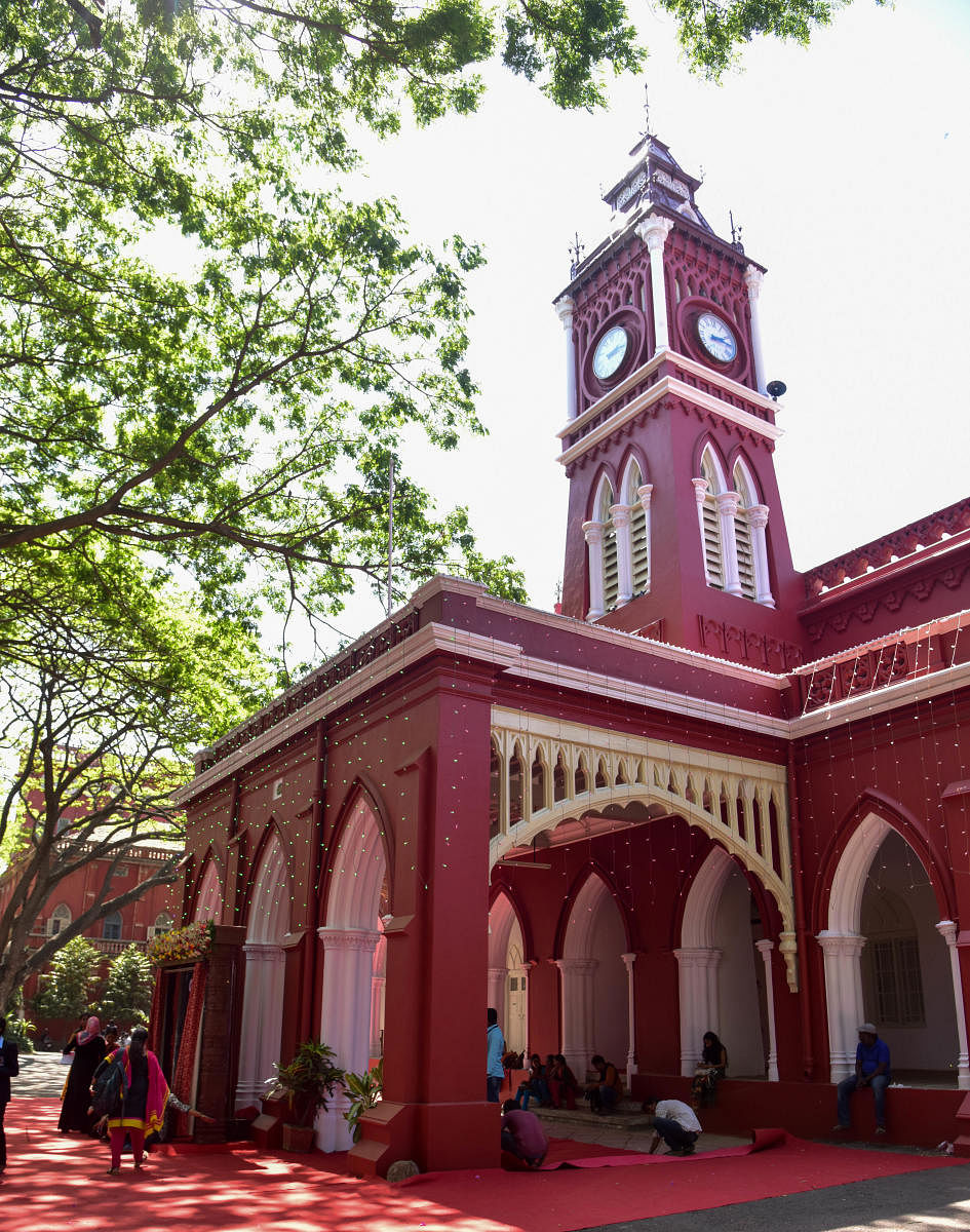 The renovated clock on the Central College Tower and Inaugurate the renovated Rajaji Hall at Clock Tower Building, Central College, Palace Road, which houses the Office of the Bengaluru Central University , in Bengaluru on Wednesday. Photo/ B H Shivakumar