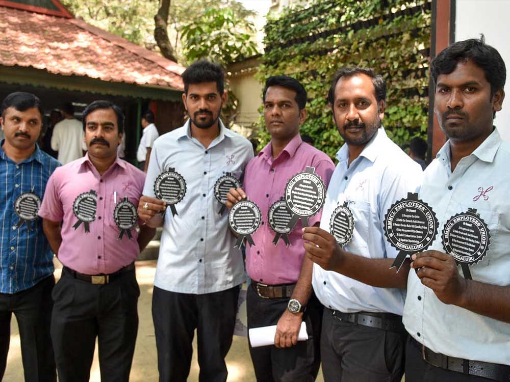 BMRCL Employees Union members wearing block badge and demanding justification for the proposed indefinite strike and full fill demands at press meet in Press Club in Bengaluru on Friday. DH file Photo.