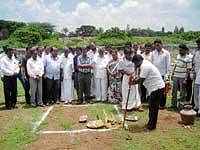 Legislator Y Sampangi performing ground-breaking ceremony for the construction of rooms for students at Swaminathapuram in the city. KDA president Muniratnam Naidu, CMC Rasheed Khan, vice president Suma are also seen. dh photo