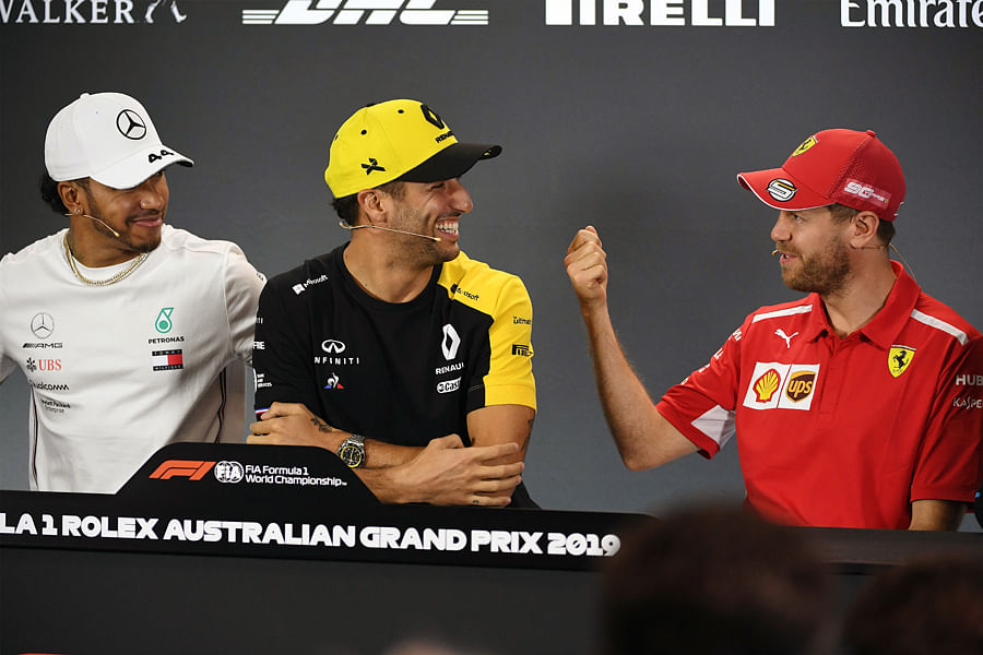 Mercedes' driver Lewis Hamilton (left), Renault's Daniel Ricciardo (centre) and Ferrari's Sebastian Vettel during the press conference in Melbourne on Thursday. Picture credit: AFP