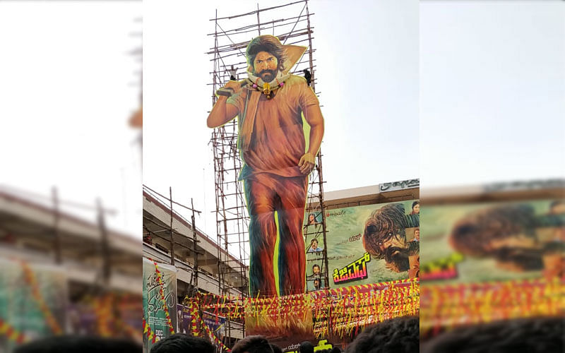 A huge cut out of actor Yash in front of a Cinema in Bengaluru on Friday. (DH Photo/Roshan Nair)