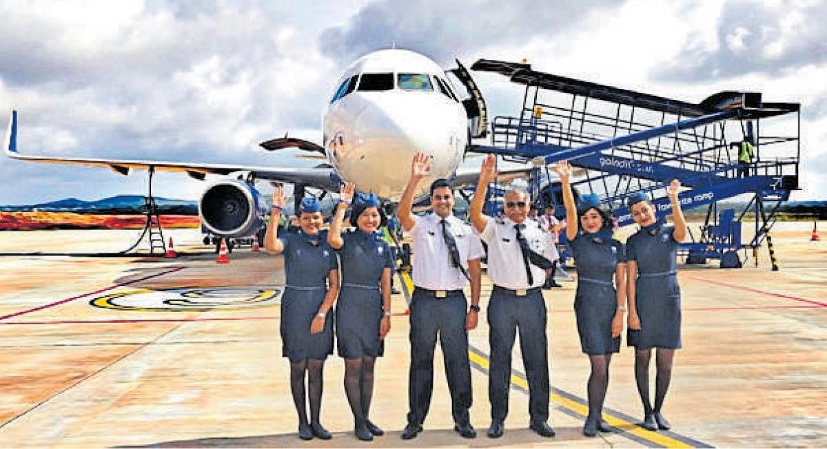 The crew of the IndiGo A320 flight, the first 180-seater passenger flight operating from Hubballi Airport, seen waving during the launch of the service. dh photo