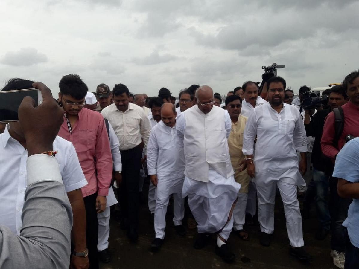 Gulbarga MP Mallikarjun Kharge inspects the ongoing works at the airport in Kalaburagi on Saturday.DH PHOTO