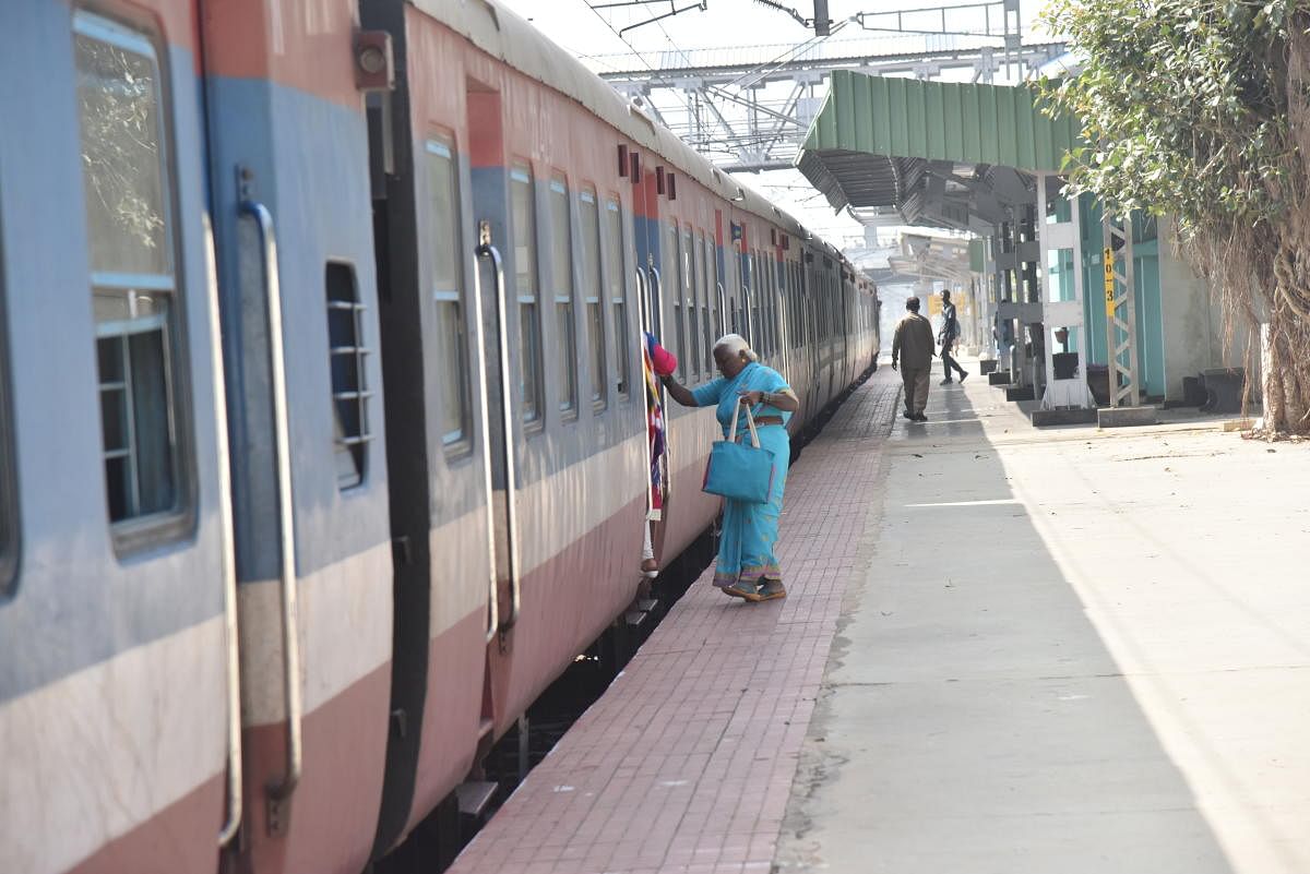 A passenger boarding a DEMU train at Yeswanthapura Junction to go to Devanahalli on Friday