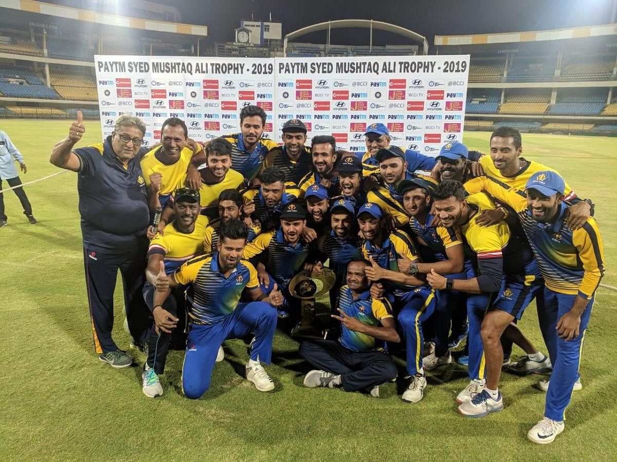 UNDISPUTED CHAMPS: Karnataka players celebrate with the Syed Mushtaq Ali Trophy at the Holkar stadium in Indore Thursday.