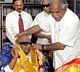 Karnataka Chief Minister B S Yeddyurappa with Tamil Nadu Chief Minister M Karunanidhi during a meeting at his residence in Chennai on Thursday. PTI