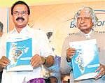 Former President A P J Abdul Kalam (right) and Chief  Minister D V Sadananda Gowda releasing a booklet at the 14th edition of Bangalore IT.biz on Tuesday. DH Photo