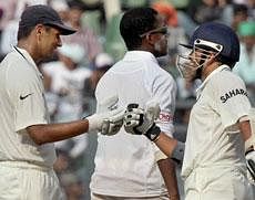 India's Rahul Dravid and Sachin Tendulkar celebrate a shot on Day 3 of the 3rd test match against West Indies in Mumbai on Thursday. PTI