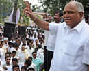 B S Yeddyurappa waving gathering people at KJP meeting before he submit resignation to MLA post at freedom park in Bangalore on Friday.  DH photo