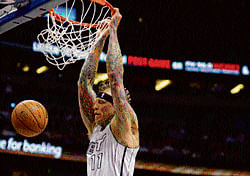 easy does it Miami Heats Chris Anderson dunks during their match against&#8200;Orlando Magic in the NBA in Orlando on Monday. Heat defeated Magic 108-94. AP photo