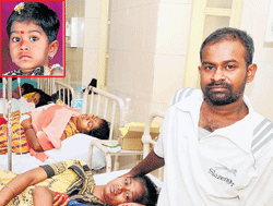 A Grim tale: Bala Murugan (right), the father of six-year-old Ganga Murugan (inset), who died of food poisoning, along with son Chandru and wife Parameshwari, at the  Victoria  Hospital, Bangalore on&#8200;Saturday.  DH photo
