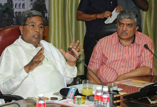 Chief Minister Siddaramaiah at Aadhar card review meeting. DH photo