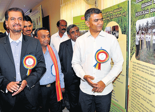 Agriculture Minister Krishna Byre Gowda and Horticulture department Principal Secretary  M K Shankarlingegowda at an exhibition organised by the Karnataka State Organic  Certification Agency on Thursday. dh photo