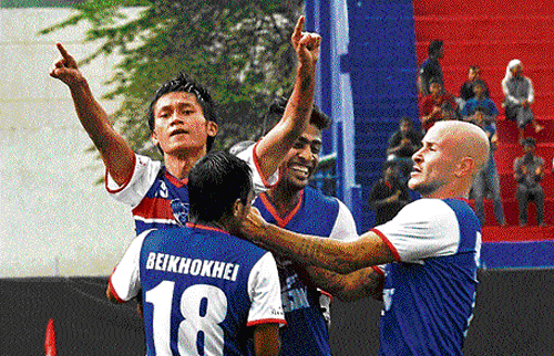 On target: Siam Hangel (facing camera) of Bengaluru FC celebrates after scoring against Dempo in their I-League match on Wednesday. dh photo/ srikanta sharma r