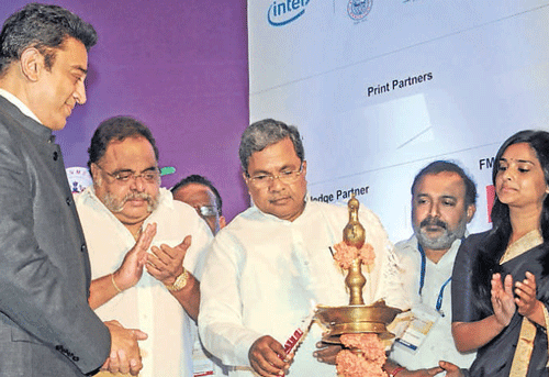 Karnataka CM Siddaramaiah inaugurating FICCI Media and Entertainment Business Conclave 2013 in Bangalore on Tuesday. Actor Kamal Haasan (extreme left) is seen. DH Photo