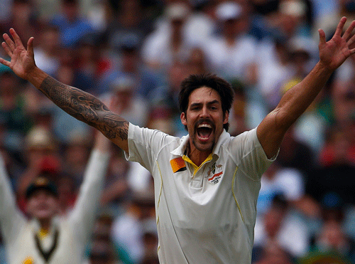 Australia's Mitchell Johnson appeals for a successful wicket of England's Stuart Broad during the second day of the fourth Ashes cricket test at the Melbourne cricket ground December 27, 2013. REUTERS
