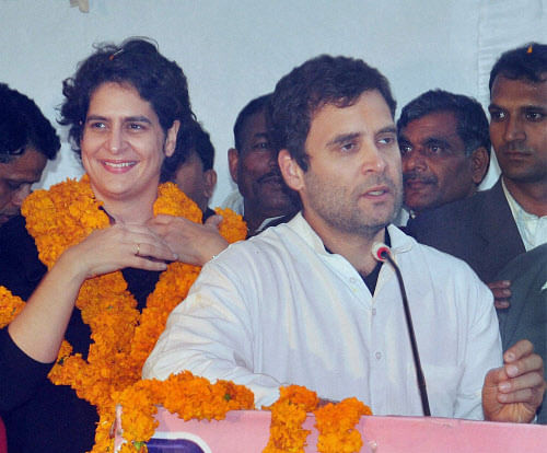 Congress Vice President Rahul Gandhi with sister Priyanka Vadra at a programme during 2nd day of his visit to Amethi on Thursday. PTI Photo