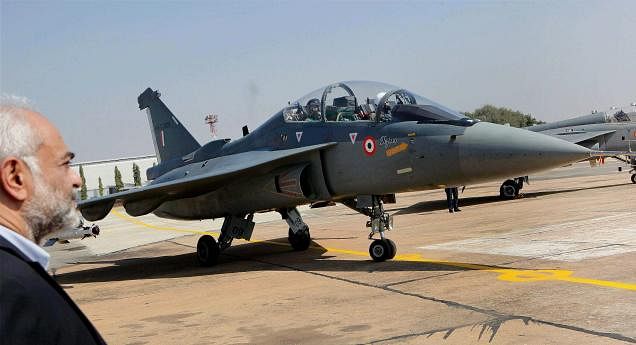 A file picutre of the trainer version of prototype indigenously developed Light Combat Aircraft (PV5) "Tejas" taxing after a successful flight at HAL Airport in Bangalore. Photo: PTI