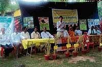 Ashadayaka Krishi Parivara President B C Aravind speaking after inaugurating the Organic Farming Festival at Kalanathapura village in Mudigere taluk on Monday.  DH hoto