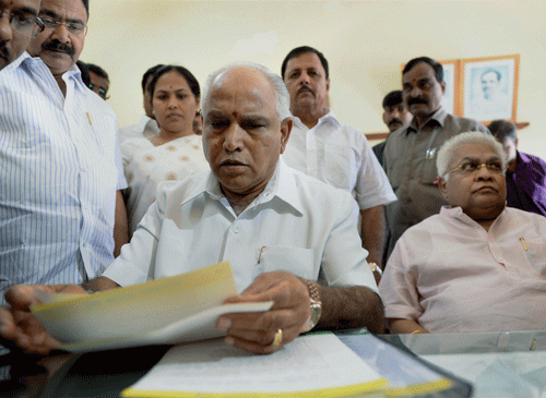 Former Chief Minister B S Yeddyurappa and Union Ministers Mallikarjun Kharge and M Veerappa Moily today entered the fray for the April 17 Lok Sabha polls in Karnataka. PTI File Photo