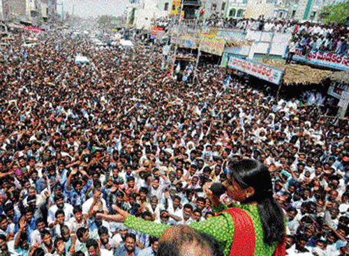 all ears: YSR Congress Party leader Sharmila addresses a rally at Ongole in Andhra Pradesh on Saturday. pti