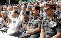 Officers at the Armed Forces Flag Day organised at Raj Bhavan in Bangalore on Monday.. DH photo