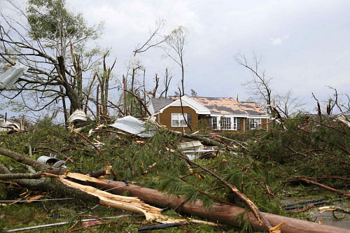 A home on Joyner Ave. which used to be surrounded by oak and pine trees was left destroyed following a Tornado that ripped through Tupelo Mississippi. Reuters Image
