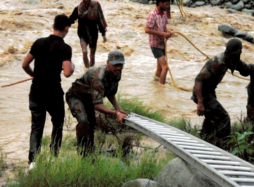 With improvement in weather conditions, Army will intensify its rescue operation in flood-ravaged Jammu and Kashmir while focusing first on Srinagar city and South Kashmir where a large number of people remain trapped in their houses without any basic amenities. PTI file photo