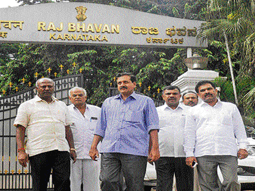 JD(S) leaders Y S V Datta, Chowda Reddy, Maritibbegowda, Puttanna and others come out of the Raj Bhavan after submitting a complaint to the Governor against the Visvesvaraya Technological University Vice Chancellor H Maheshappa, in Bengaluru on Friday. DH photo