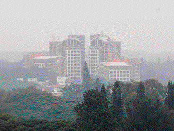 Hazy: Misty clouds blanket the City as the thick of winter rolls in on Sunday. DH PHOTO