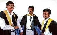 Chinnari Shrinidhi (centre - 11 gold medals),  S R Bharath and B K Somith (6 gold medals each) at the 9th Annual Convocation of VTU in Belgaum on Thursday. DH Photo