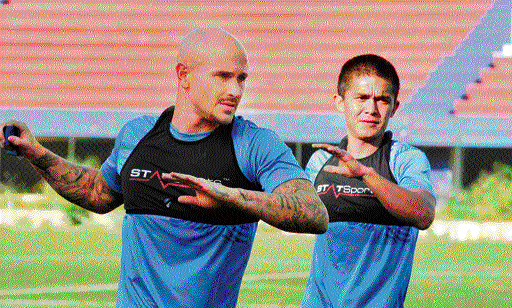 in fine fettle: BFC's Sean Rooney (left) and Sunil Chhetri during a practice session on the eve  of their AFC&#8200;Cup tie against Maziya S&RC on Monday. dh photo/ Srikanta Sharma R.