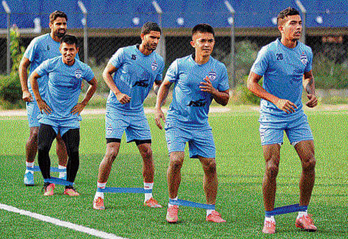 Bengaluru FC's skipper Sunil Chhetri (second from right) leads his teammates during a practice session on Monday in Bengaluru.DH photo/ Srikanta Sharma R