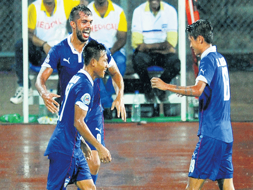 Bengaluru FC's Udanta Singh (right) celebrates with team-mates after scoring against Persipura Jayapura on Tuesday. DH PHOTO/ SRIKANTA SHARMA R