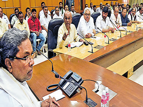 Chief Minister Siddaramaiah at a meeting with elected  representatives from Dharwad and Belagavi districts in Bengaluru on Thursday. DH photo