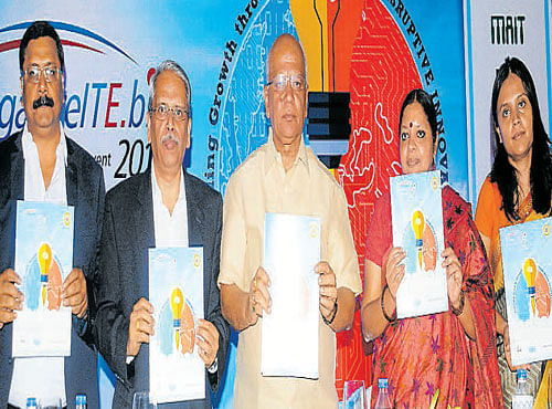 IT Minister S R Patil releasing the Bangalore ITE.biz 2015 brochure at a press conference in Bengaluru on Friday. (From left) STPI Director P K Das, IT Vision Group Chairman Kris Gopalakrishnan, Karnataka State Govt. IT, BT and S&T Secretary V Manjula and IT, BT and S&T Director Tanusree Deb Barma are seen. DH PHOTO