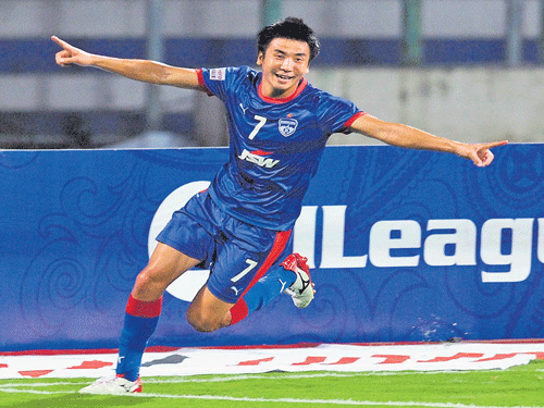flying high Bengaluru FC's Kim Song Yong celebrates after scoring against Lajong on Sunday. DH photo/ kishor kumar bolar